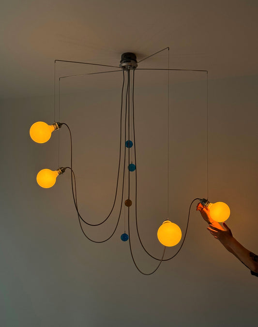 Yo-yo suspension by H. Khademi for Debsch Lighting